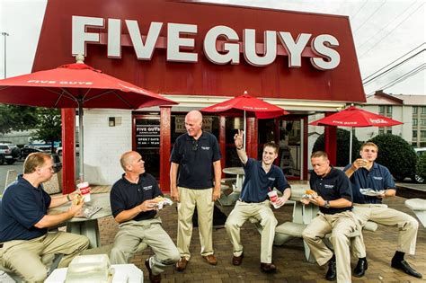 who owns five guys franchise.